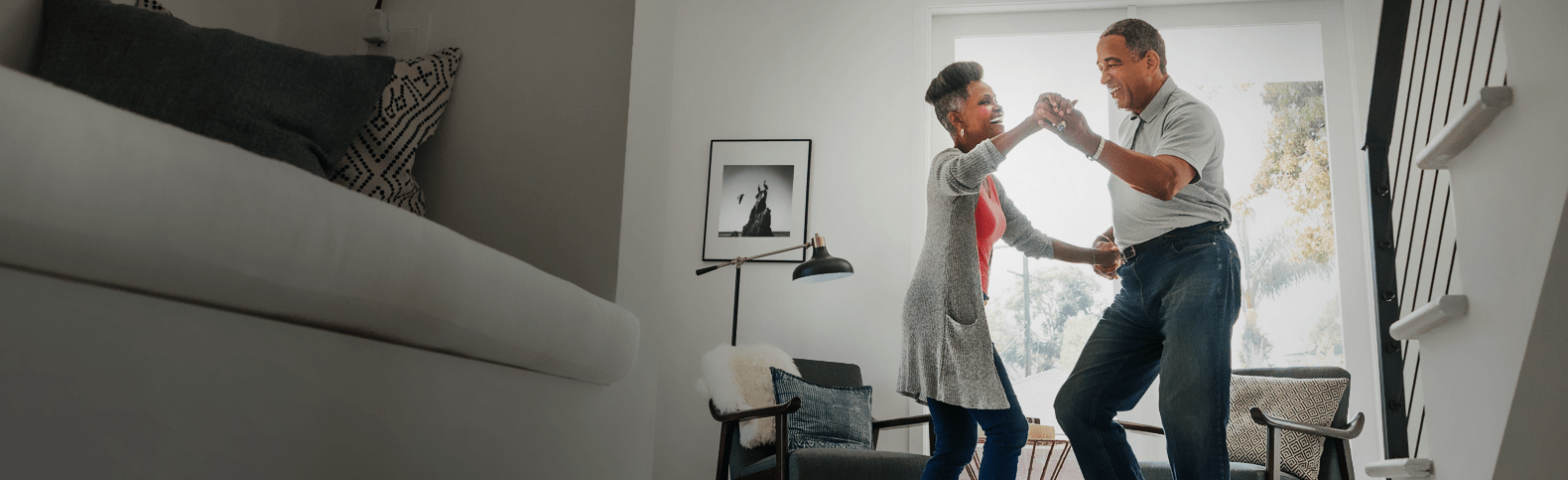 couple dancing in their home